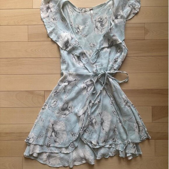 Soft and romantic wrap mini dress in a pale blue floral print by Free People - Picture 4 of 8